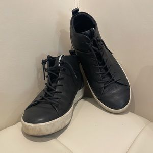 Black leather high top sneakers